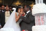 PM Tsvangirai kisses his bride Elizabeth at their wedding