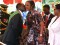 Zimbabwe's President Robert Mugabe (L) kisses his mistress turned wife Grace as he arrives to attend his country's 33rd independence celebrations at the National Sports stadium in Harare, April 18, 2013