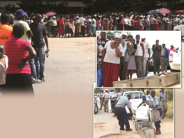 Nkulumane residents queue to view the bodies of the murder victims before the police carried them away. (Pic by The Chronicle)