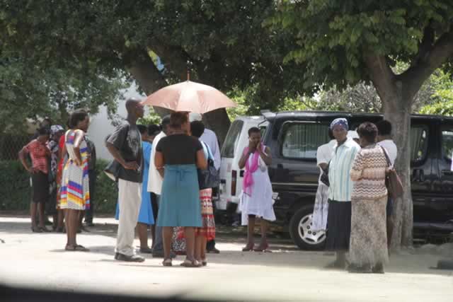 File picture of people waiting outside the Western Commonage Magistrates Courts in Bulawayo
