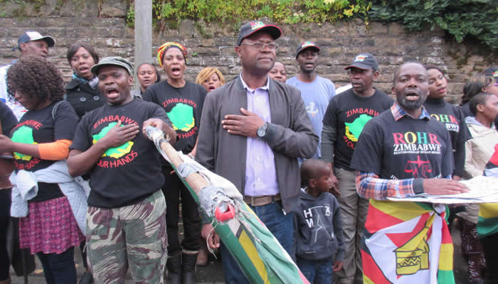 About fifty people gathered in Nottingham on Tuesday to protest outside a clinic run by Dr Sylvester Nyatsuro who is trying to seize a farm in Zimbabwe