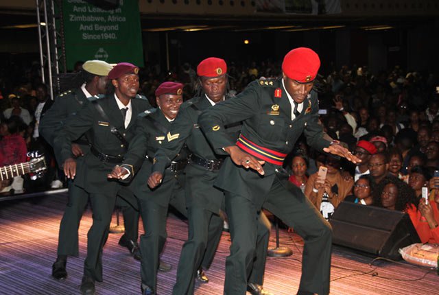 MAIN ACT . . . Jah Prayzah leads his troops in a dance drill at “Mdhara Vachauya” album launch at the Harare International Conference Centre on Friday night