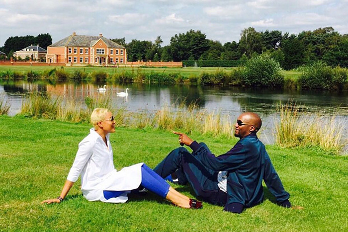Prominent preacher Uebert Angel and wife Beverly share a loving moment in their 13 acre private garden at their massive mansion home in the United Kingdom.