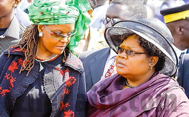 In happier times: First Lady Grace Mugabe and the then Vice President Joice Mujuru