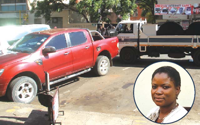 Staff from the Messenger of Court attach Cde Kagonye’s (INSET)double cab Ford Ranger along George Silundika in Harare