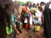 Mai-Mugabe-waters-a-tree-after-planting-at-elephant-hills