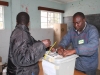 polling-officers-sealing-ballot-boxes-before-voting-starts-in-domboshava-jpg