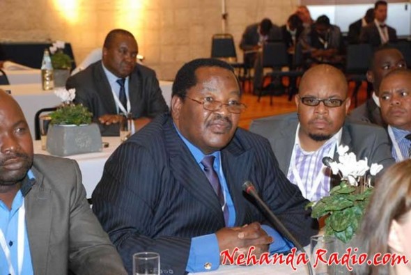 Mines Minister Obert Mpofu (centre) is a man of significant means