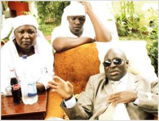 Godfrey Nzira with his many wives Godfrey Nzira with his many wives
