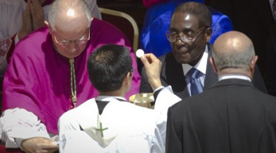 Mugabe recieves holy communion at the Vatican Robert Mugabe receives Holy Communion at the beatification Mass in St Peter's Square