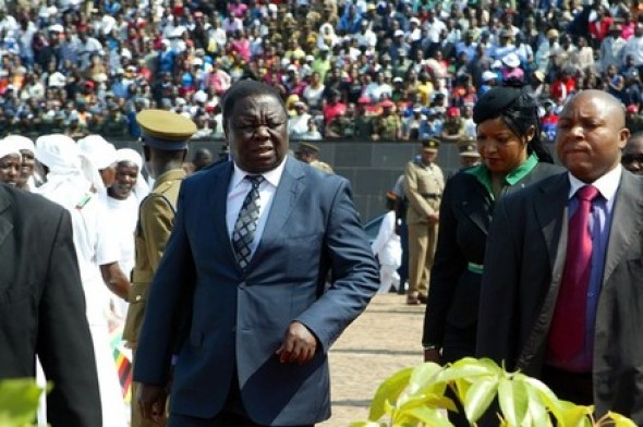 Zimbabwean Prime Minister Morgan Tsvangirai (L) flanked by his wife Elizabeth Macheka Tsvangirai (R) arrive on August 13, 2012 at the National Heroes Acre in Harare to attend the commeration of the Heroes Day celebrations. 