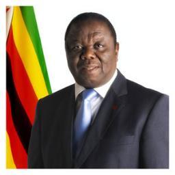 tsvangirai-zimbabwe-flag Top cop loses job over Tsvangirai picture