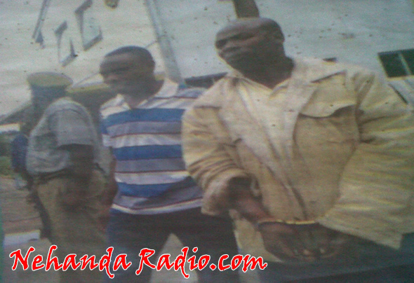 The truck driver Akidu Iweni Mukunda in handcuffs