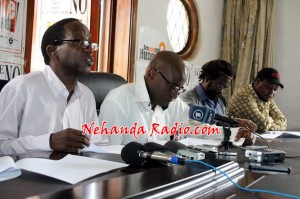 Professor Lovemore Madhuku (left) with Munyaradzi Gwisai (second from right) and Job Sikhala (right) addressing a press conference.