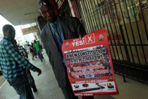 zimbabwe referendum - man with MDC poster