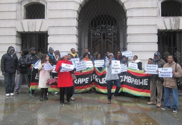 Zimbabwe Vigil members outside South Africa House in London