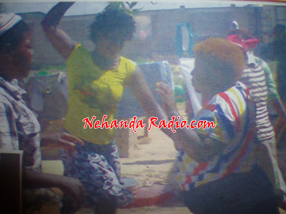 Mob Justice... the unidentified woman receives a beating from Getrude’s neighbours