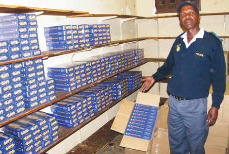 CONTRABAND: Lt Mello of Lebowakgomo with smuggled cigarettes worth an estimated R600000. Picture: SAPS