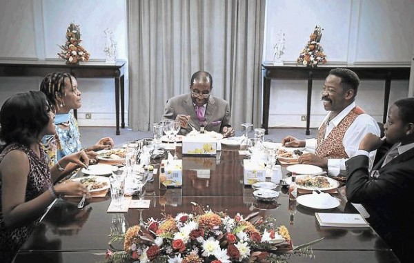 From left, Bona Mugabe with her mother Grace, father Robert, TV host Dali Tambo, and Mugabe's youngest son, Bellarmine, at lunch in State House in Harare. Image by: PEOPLE OF THE SOUTH/SABC