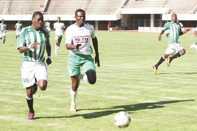 THE RACE IS ON . . . Tripple B striker Alick Marime (left) and CAPS United defensive rock Arnold Chivheya find themselves in a sprint for the ball during their two teams’ Castle Lager Premiership clash at the National Sports Stadium yesterday
