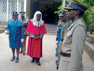 High Court judge Justice Lawrence Kamocha inspects the ZRP Quarter Guard at the opening ceremony of the Gweru High Court circuit