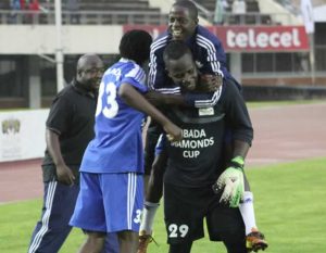 BOUNDLESS JOY . . . How Mine’s veteran goalkeeper Ephraim Mazarura (centre) is joined by his teammates and officials in celebrating their victory over CAPS United after a penalty shoot-out during yesterday’s Mbada Diamonds Cup semi-final match at the National Sports Stadium