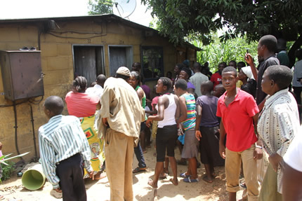 The curious crowd outside the Govha’s house