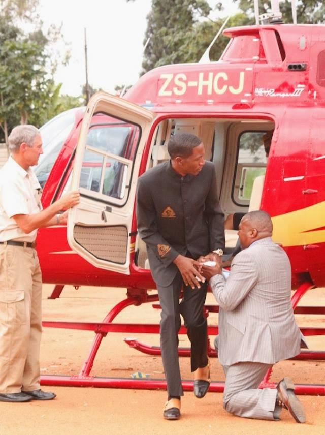 Prophet Angel flew into the year 2014 in a helicopter as he landed at the City Sports Centre to lead his thousands of followers into the New Year