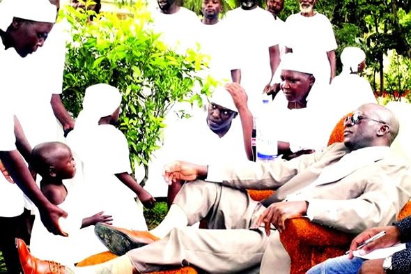 In this picture is the late convicted and later pardoned serial rapist Madzibaba Godfrey Nzira. Despite being slapped with a 32 year jail term President Mugabe pardoned the man famous for bootlicking him.