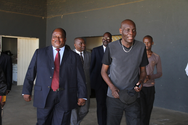 Minister Langa (left) and Oliver Mtukudzi touring Pakare Paye with NACZ officials