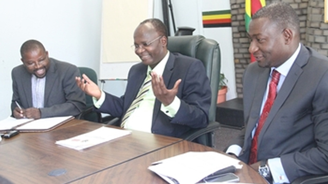Information, Media and Broadcasting Services Minister Professor Jonathan Moyo flanked by his deputy Supa Mandiwanzira (right) and new ZBC chairperson Father Gibson Munyoro during a press briefing in Harare. — (Picture By Munyaradzi Chamalimba)