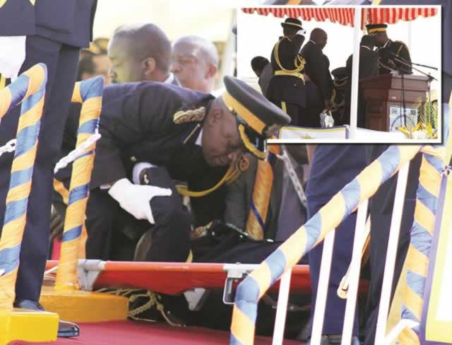 Main picture, Zimbabwe Republic Police Commissioner-General Augustine Chihuri is lifted onto a stretcher after collapsing during a graduation parade at the police Morris Training Depot in Harare yeaterday. Top right, President Mugabe looks at Chihuri