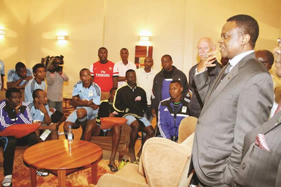 HORRIBLE GUEST RELATIONS . . .Tanzanian Ambassador to Zimbabwe Adadi Rajabu addresses the visitors in the hotel lobby last night after they were locked out of their rooms over a payment row between the hotel and Zifa