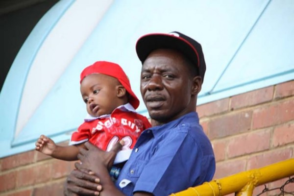 Macheso with one of his kids
