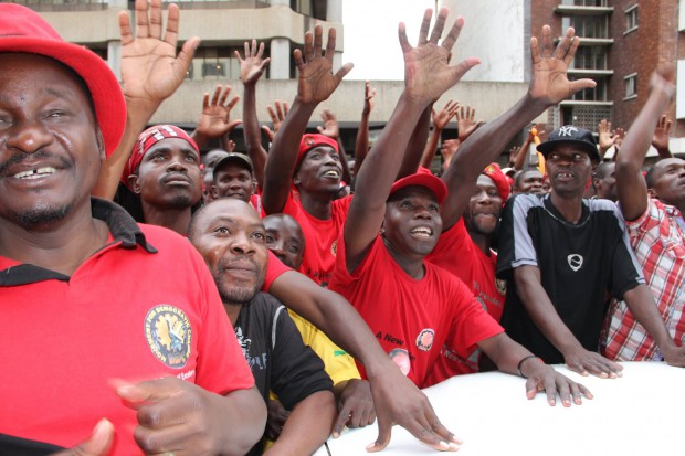 MDC-T supporters show their support for Tsvangirai outside Harvest House this week