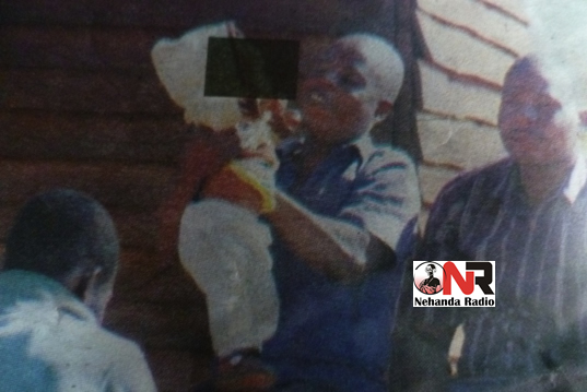 Owen with the baby at the police station