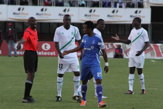 NO LOVE LOST . . . Referee Darlington Shonhiwa orders Dynamos centre-back Partson Jaure not to leave