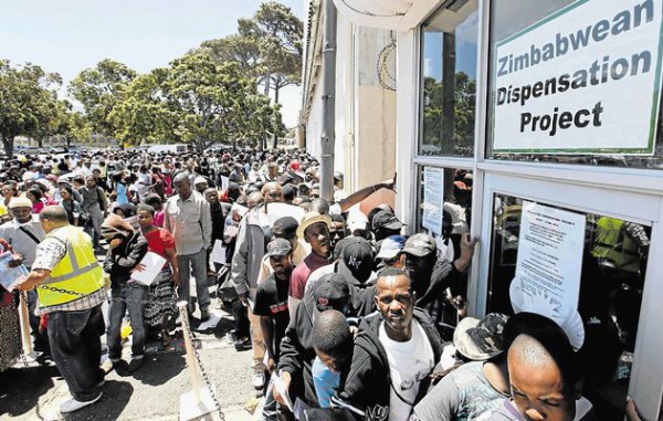 Zimbabweans stand in a long queue at a Home Affairs office in SA when a deportation deadline loomed. File photo. Image by: ESA ALEXANDER