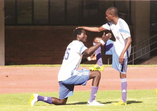THE PRINCE AND THE KING . . . Rodreck Mutuma (left) and Murape Murape celebrate the former’s opener for Dynamos at Rufaro yesterday. — Picture by Munyaradzi Chamalimba