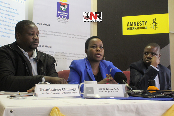 Dzimbabwe Chimbga (ZLHR), Tiseke Kasambala (Human Rights Watch) and Deprose Muchena (Amnesty International) in Harare on Thursday.