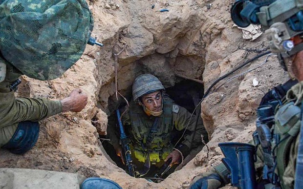 IDF soldiers uncover Palestinian militant tunnel in Gaza Strip, Palestinian Territories - 23 Jul 2014 (Photo by IDF)
