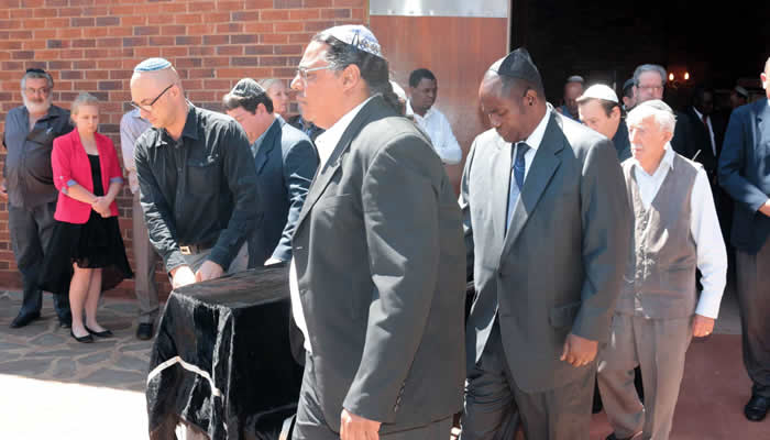 Friends to the Grave: Former RBZ Governor Dr Gideon Gono (wearing a black Jewish cap) was a pallbearer at Dr Eric Bloch's funeral (Picture by The Chronicle)