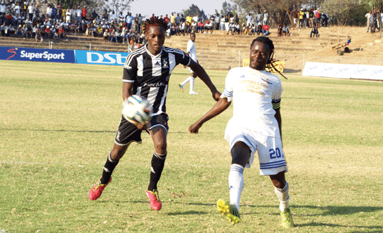 Charles Sibanda (left)