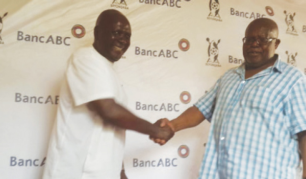 Ndumiso Gumede (right) welcomes Cosmas Zulu