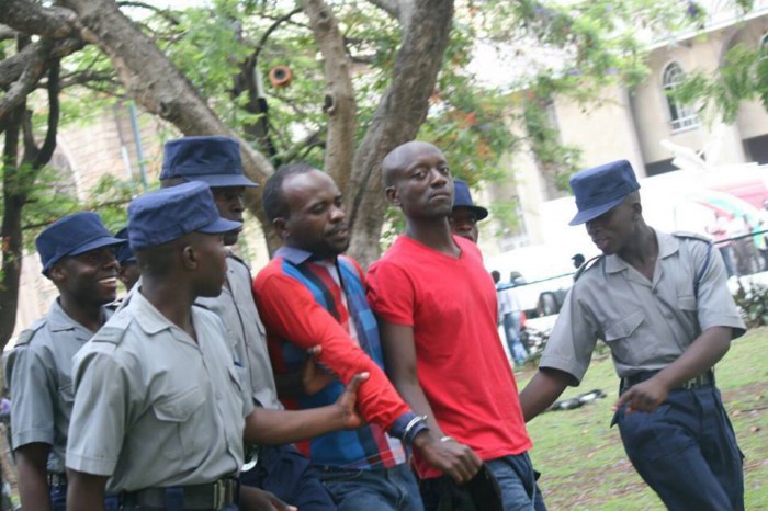 Itai Dzamara being arrested at the Occupy Africa Unity Square demo