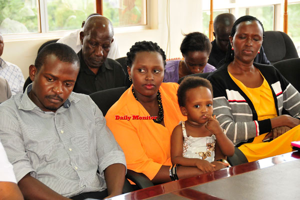 The Kamanzi family with their daughter