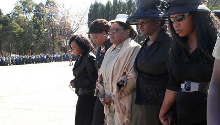 VP Joice Mujuru with her daughters during the funeral of her husband General Mujuru two years ago