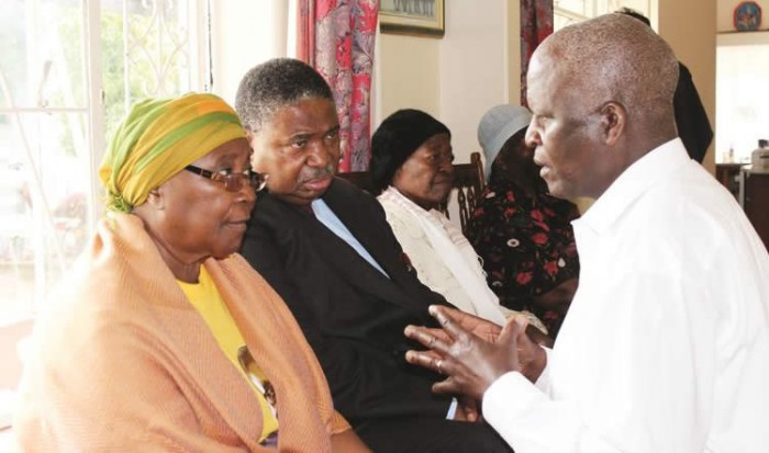 Trademan Moyo son to the late Tafi Moyo speaks to the Bulawayo Minister of State for Provincial Affairs Nomthandazo Moyo and former diplomat Ambassador Phelekezela Mphoko about the passing on of his father at the family residence in Famona (Picture by The Chronicle)