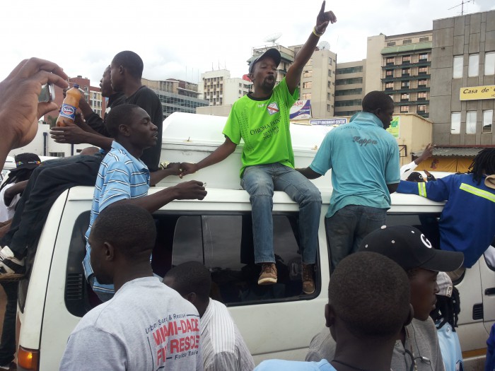 File Picture: Touts sing and parade the coffin of a departed colleague on top of a commuter omnibus (Picture by NewsDay
