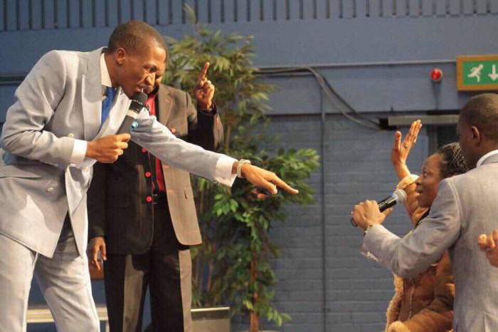 Prophet Uebert Angel on stage